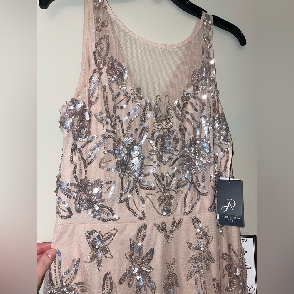 Champagne colored cocktail dress with sparkle patterns